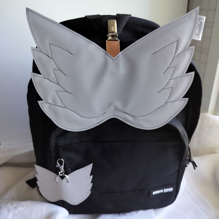 Suojelus Design - Heijastinsiivet, Enkeli